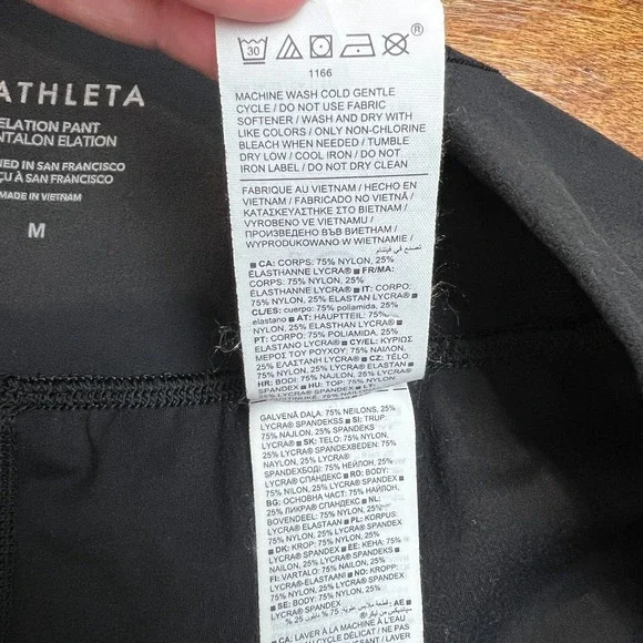Athleta Elation Pants Women Medium Black Tapered Pleated Stretch Knit Athleisure - Picture 11 of 14